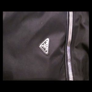 Prada saffiano leather. Nylon travel bag